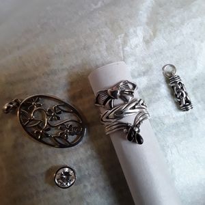 Silver pendant and chain, 3 size 8 rings,1 cubic zirconia slidder, two pendants.